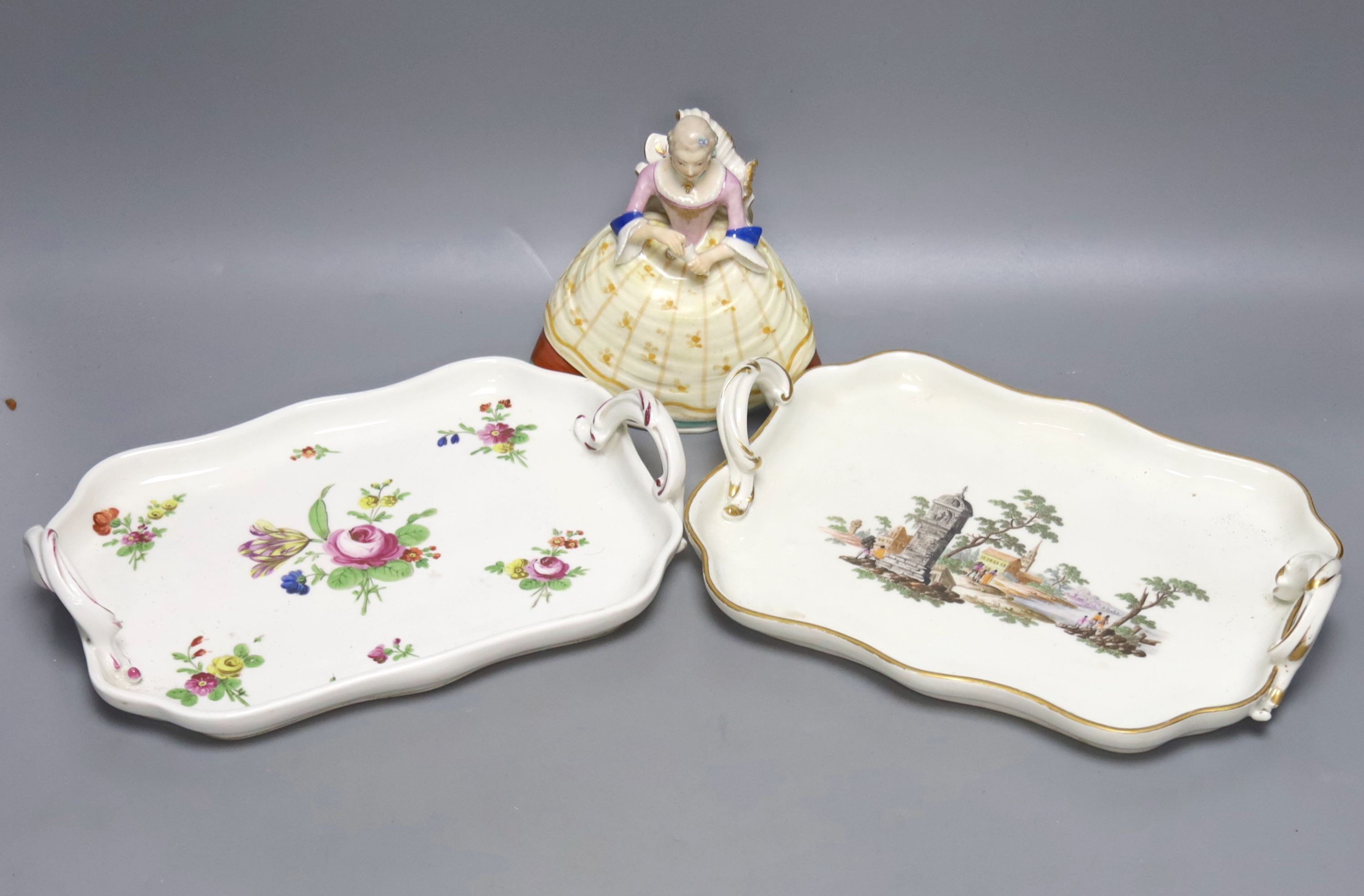 Two 18th century Vienna porcelain trays and a seated figure, largest tray 16cm